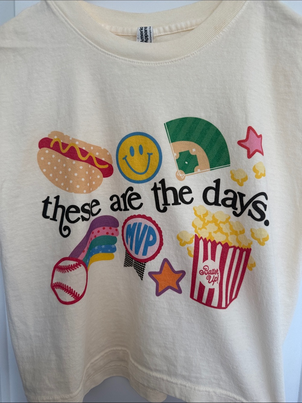 Graphic Tee in Cream with Colorful Icons